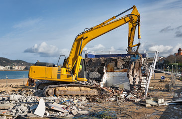 Demolition of a hot dog stand at the beach in San Sebastian - Donostia, Spain
