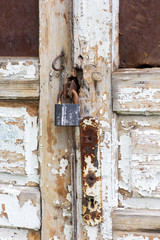 Closeup old  wooden door with lock