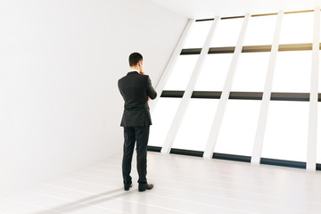 Fototapeta premium Businessman white room