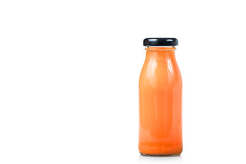 Orange juice glass bottle. Isolated on white background
