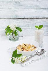 Healthy organic breakfast with muesli and smoothie