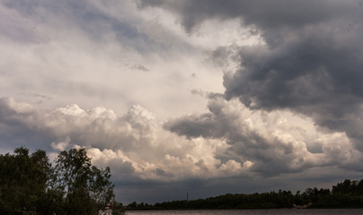 Fototapeta na wymiar Background of storm clouds before a thunder-storm