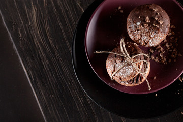 Christmas almond cookies with pieces of chocolate on the plate a