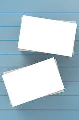 stack of blank name card on blue background