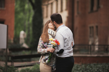Loving couple posing in the old town