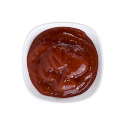 Bowl of tomato sauce sauce on white background