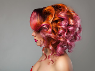 Girl wiht curly hair.