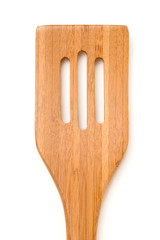 flat rectangular spatula with hole.