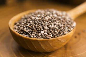 chia seeds on wooden spoon