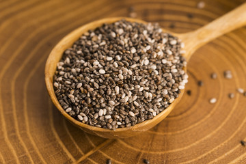 chia seeds on wooden spoon