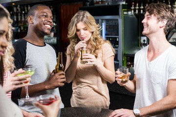 Group of friends having a drink 