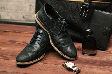 Collection of man's business accessories and clothes.