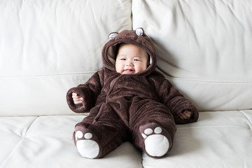 Asian newborn baby wearing bear suit © alice_photo