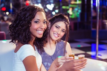 Pretty girls having shots