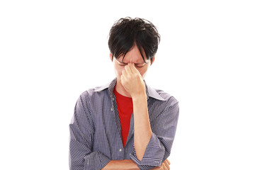 頭痛を訴える男性