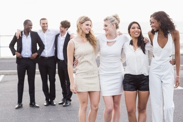 Well dressed people posing 