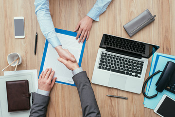 Business people shaking hands