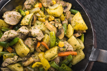 fried potatoes with vegetables