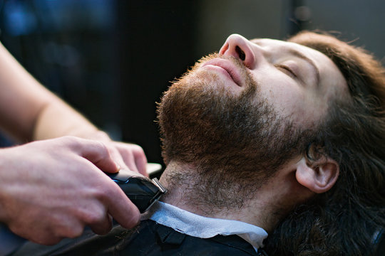 man's face at the barber's