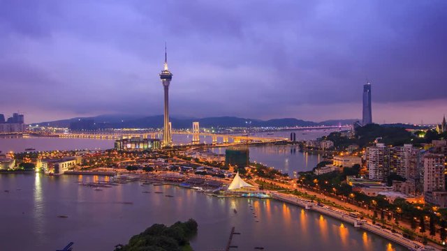 Macau Cityscape Day To Night Time Lapse (pan shot)