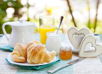 Romantic breakfast Croissants, coffee, juice