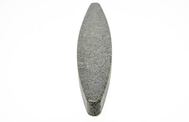 Grindstone or whetstone sharpener on white background