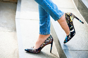 woman feet in high heel shoes
