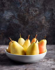 Fresh Organic Pears in the plate Copy space