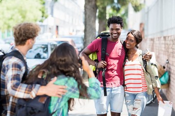 Woman taking photo of her friends