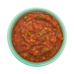 Bowl of chunky salsa sauce on a white background