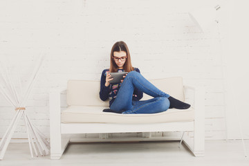 Teenager girl with tablet pc relax at home