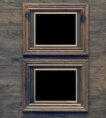 frames on wooden wall