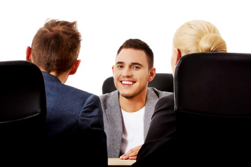 Business meeting-three people sitting and talking
