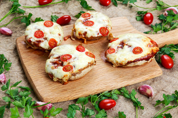 Cooked Mushrooms stuffed with cheese and plum tomatoes