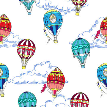 Seamless pattern with clouds and hot air ballons