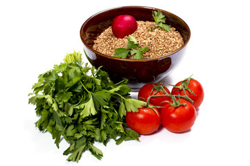bowl with buckwheat, parsley, fennel and tomatoes