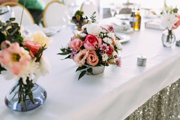Cute tiny bouquet of flowers on the table