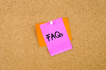 FAQs written on paper note