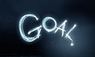 Word goal on dark backdrop
