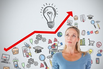 Composite image of a businesswoman who is looking a graphic