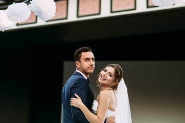 Joyful first dance of the new wife and husband