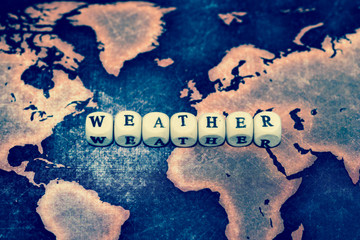 WEATHER on grunge world map