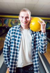 Young man at the bowling alley