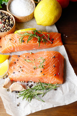 Raw salmon on baking paper