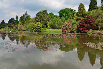 An English country garden with a lake in late springtime.