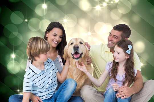 Composite image of happy family with a dog