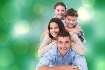 Fototapeta premium Composite image of happy family 