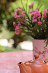 Brown chinese teapot on the table.