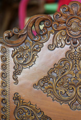 Thai style teak wood carving.