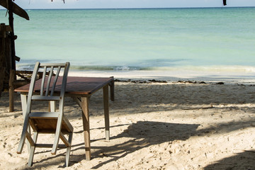 Desk and chair on beach